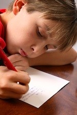 boy writing letter