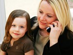 parent advocate mom on phone and daughter