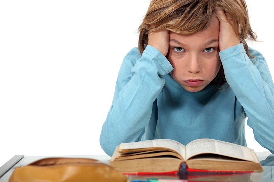 boy struggling to read