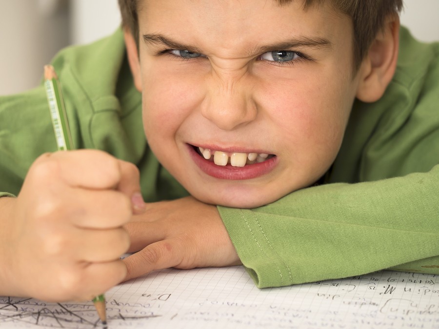 boy having difficulty reading