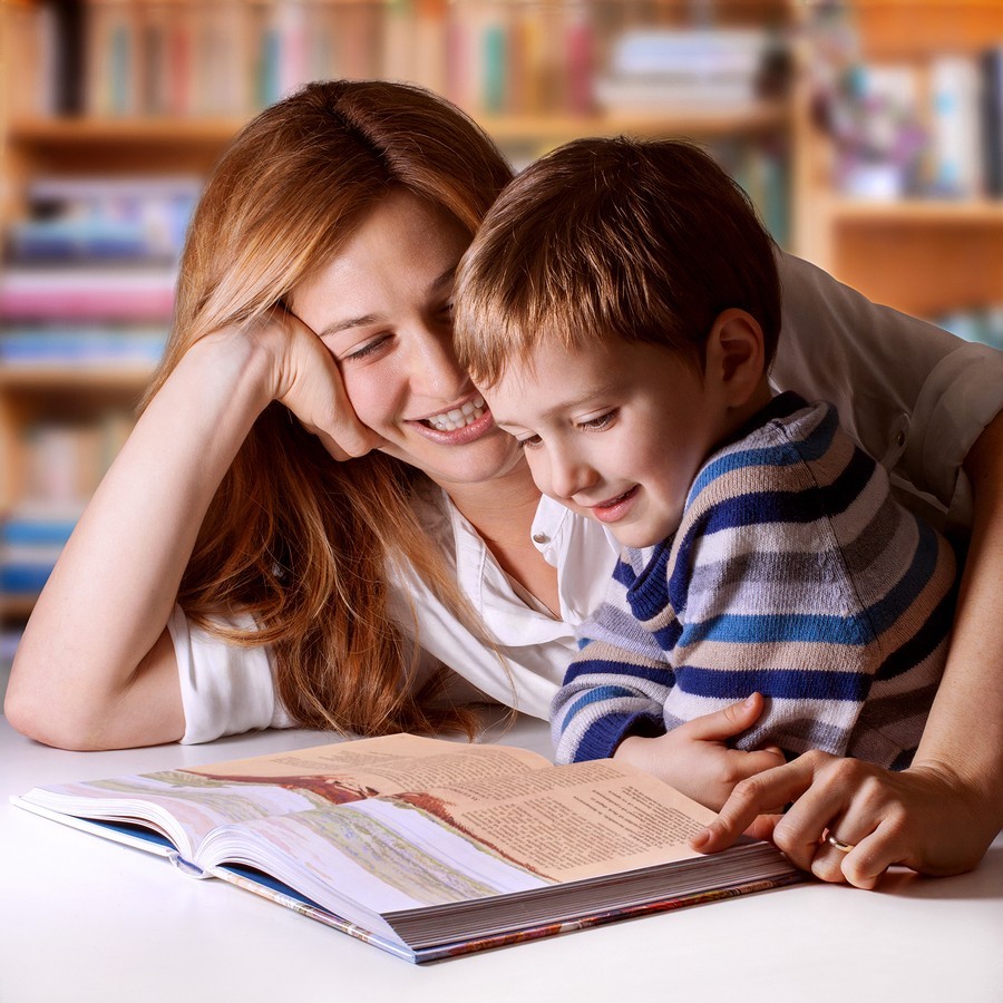 mom boy reading