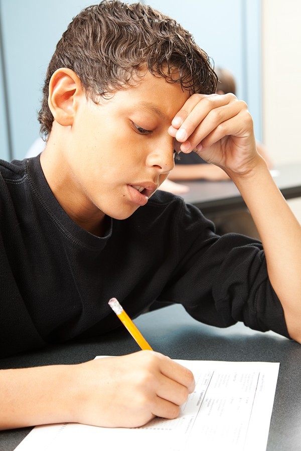 boy struggles with schoolwork