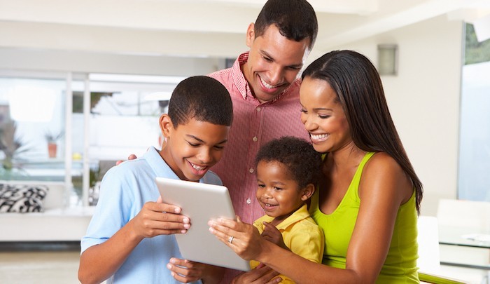 image family reading on computer