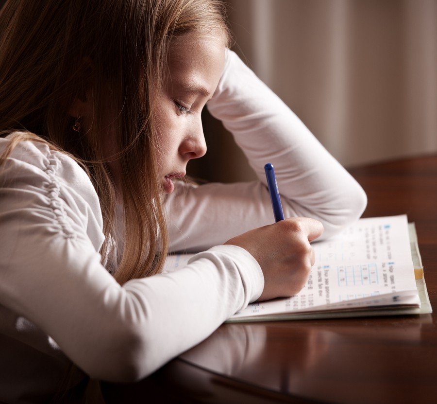 girl struggling with school work