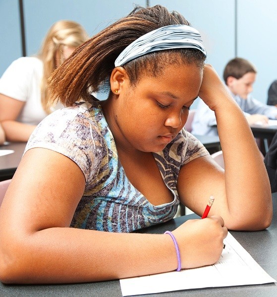 girl in class taking test