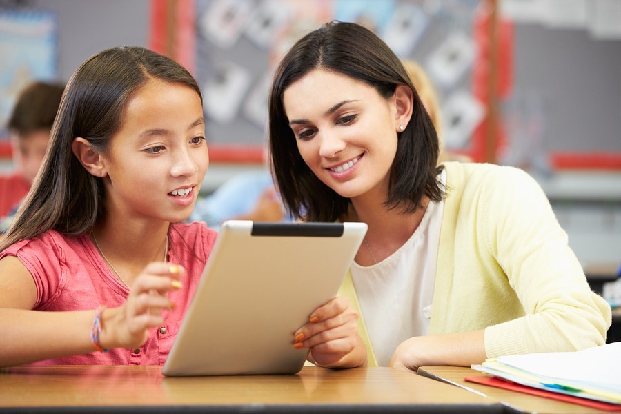 chlldren in class with teacher