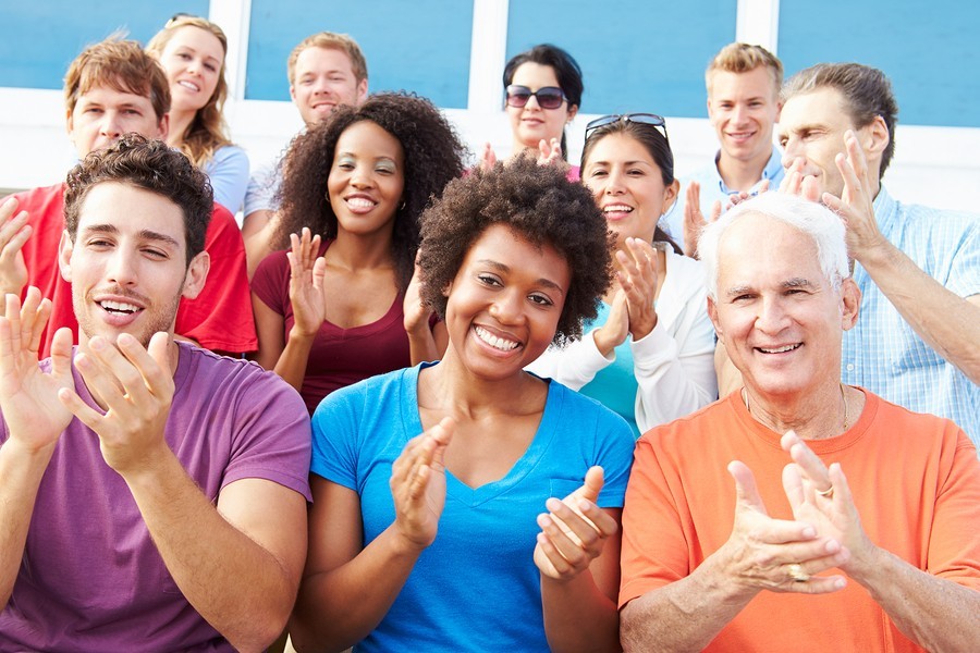 people clapping for school success