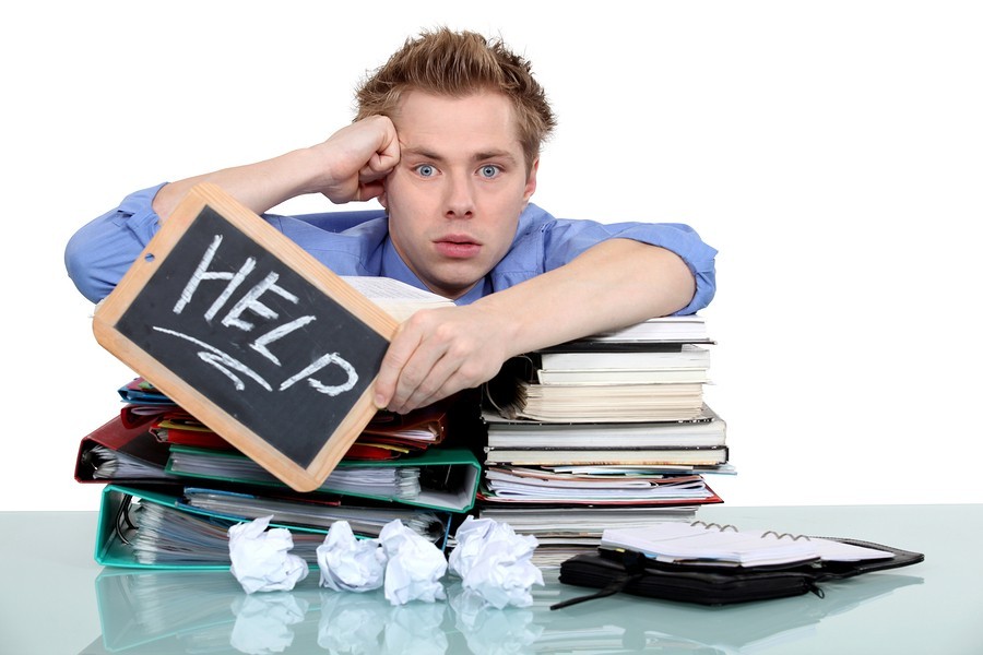 boy at school trying to read