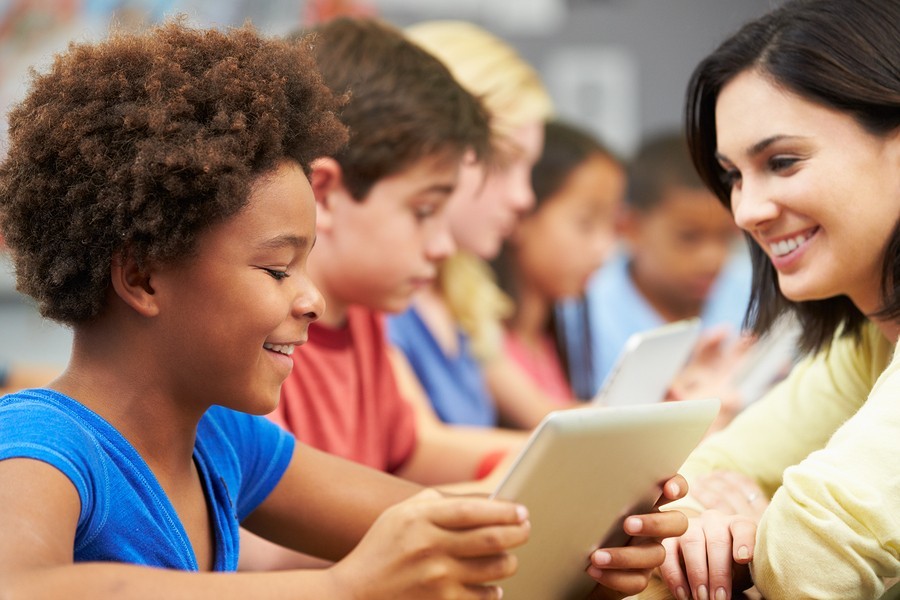 kids in classroom with teacher