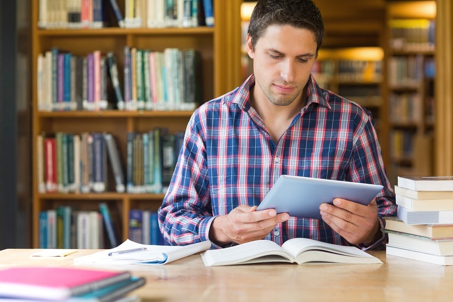 man studying in library