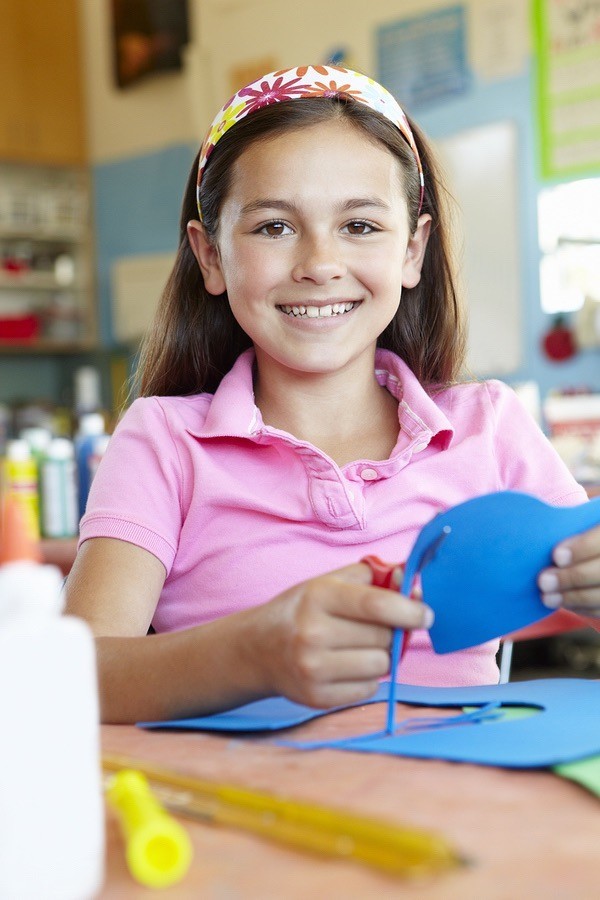 young girl in classroom art class