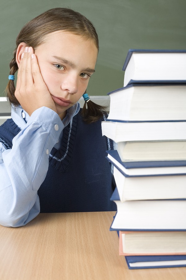 teen boy with books