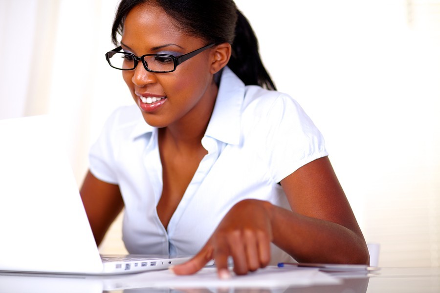 woman studies on computer