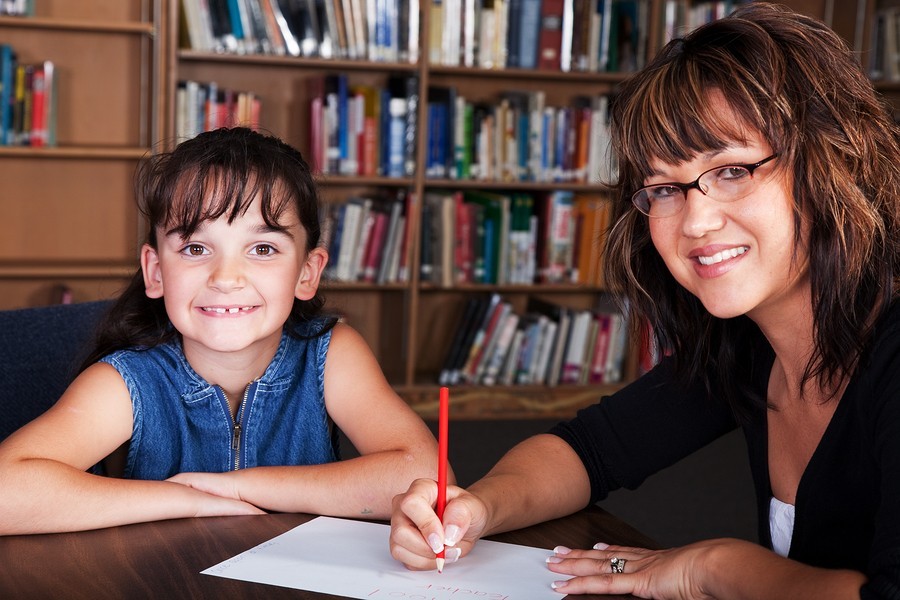 mother and daughter reading