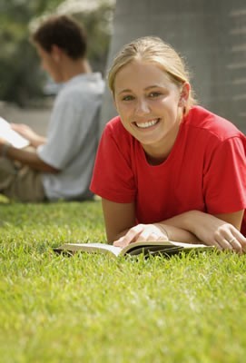 girl in class writing