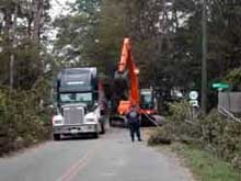 Workers clearing roads