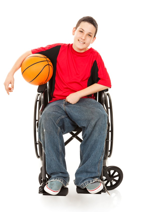 student with basketball in a wheelchair