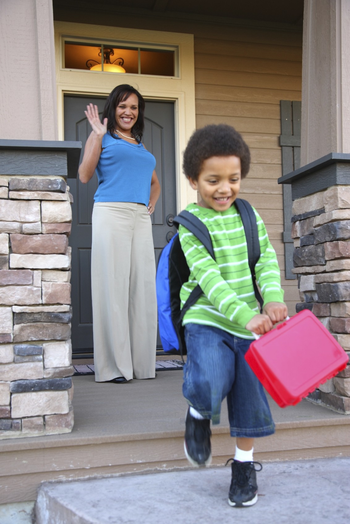 boy with back pack going back to school