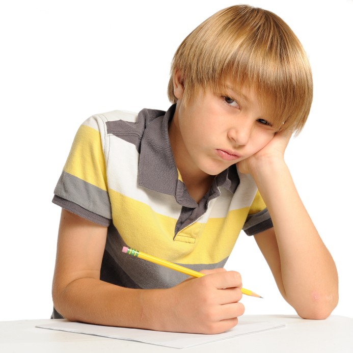 image of boy at school looking frustrated