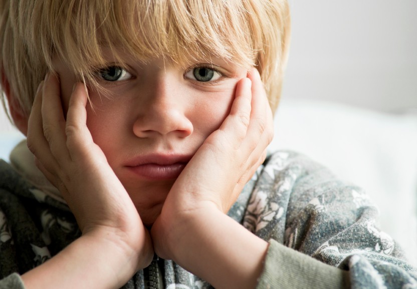 image of young boy frustrated at school