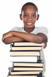 school boy with stack of books