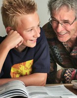 boy and teacher reading