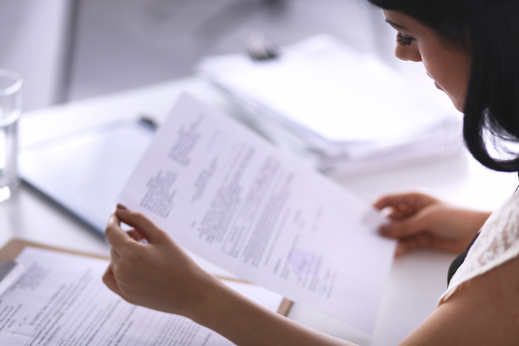 image of women reading documents for meeting