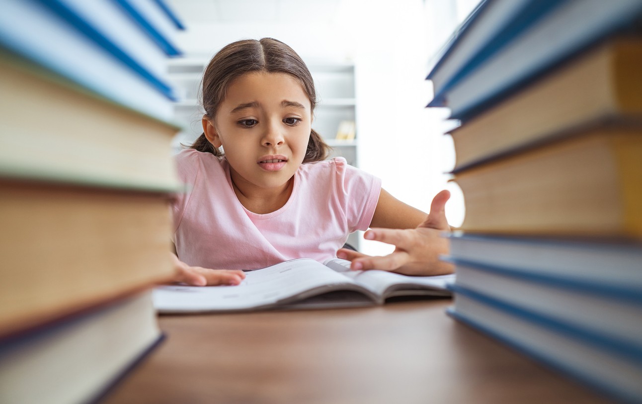 image of girl student working in class