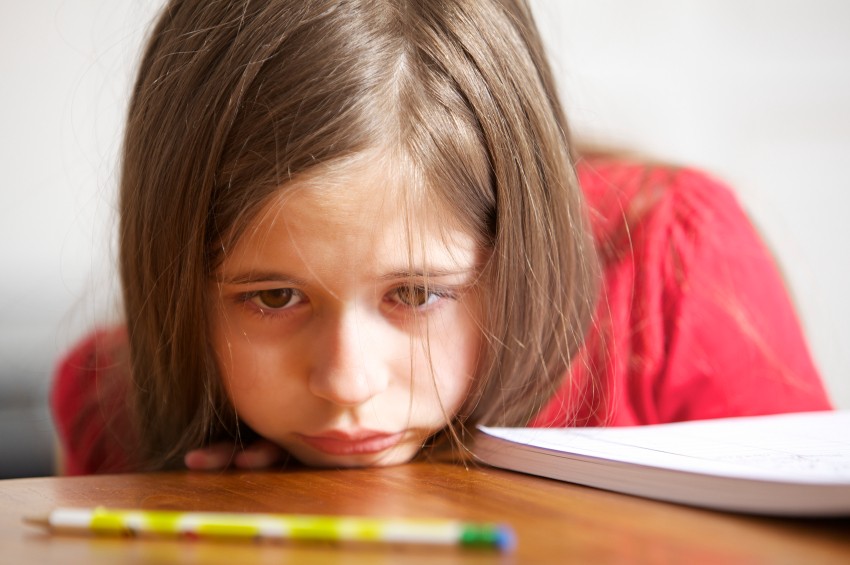 girl struggles with reading in school