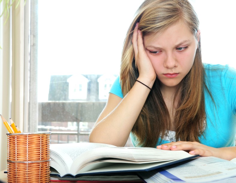 boy appears upset when struggling in school