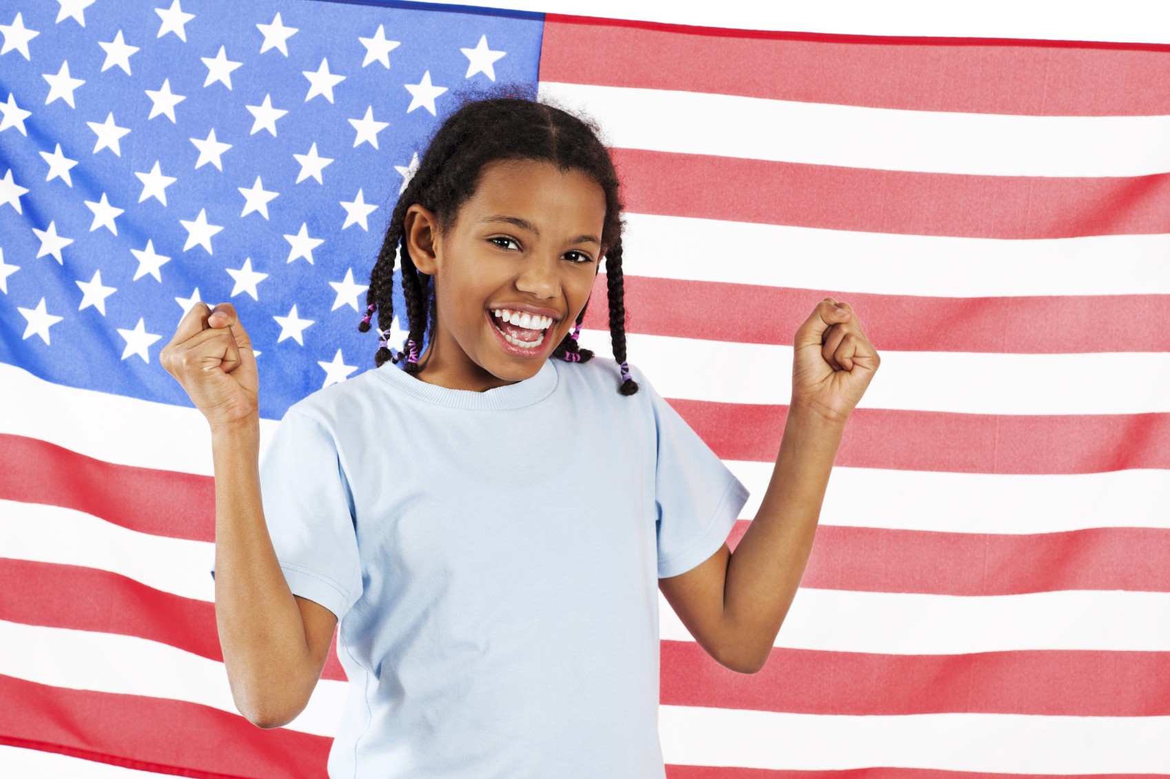 teen girl in front of US flag