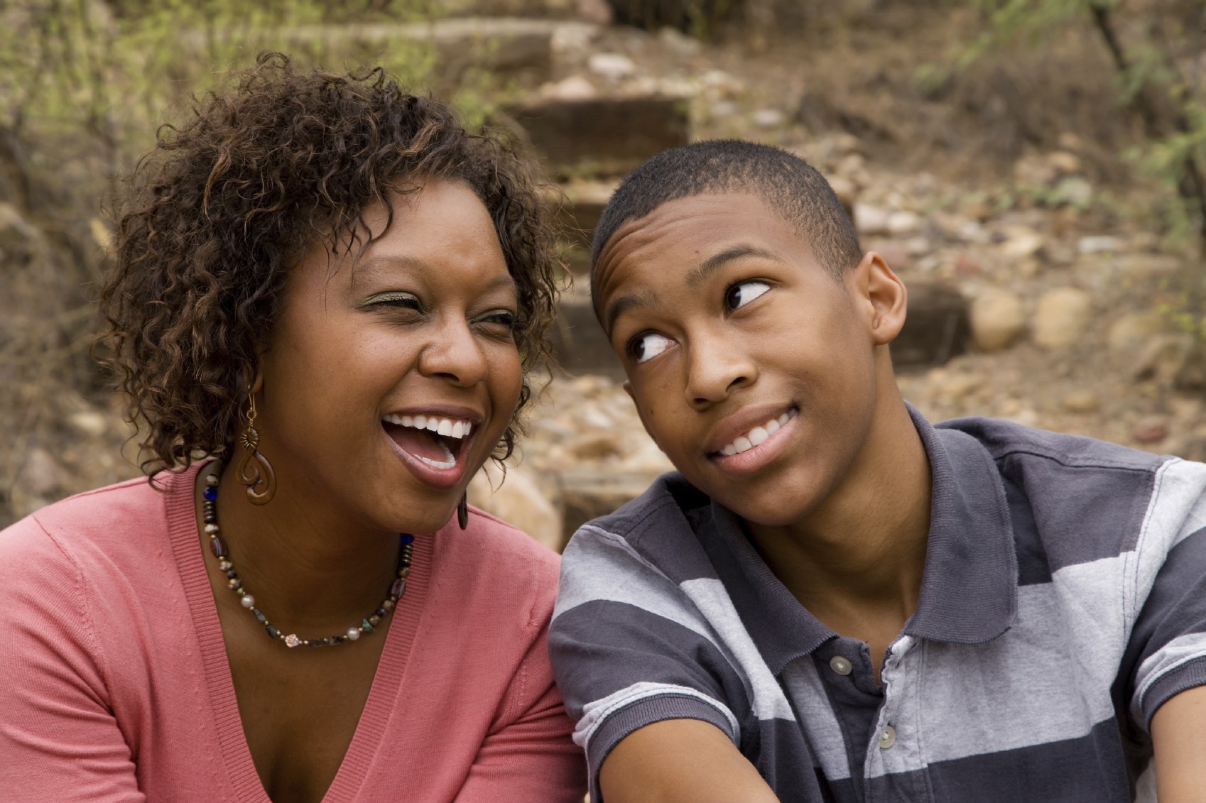 mom and teen son outside