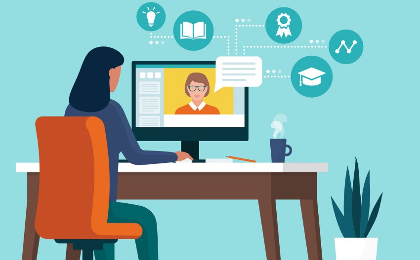 woman sitting at computer participating in a virtual IEP meeting