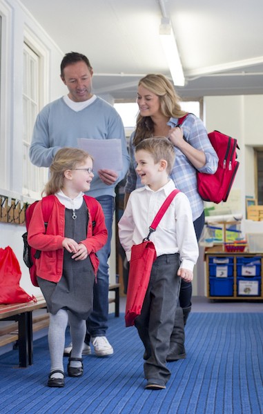 image of parents and kids in hallway at school