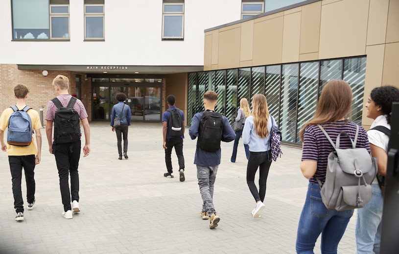 image of kids entering school building