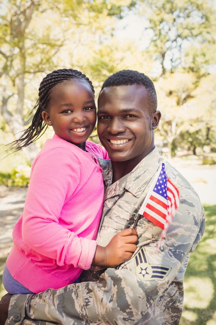 image of soldier dad with daughter