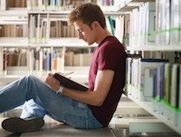 teen in library