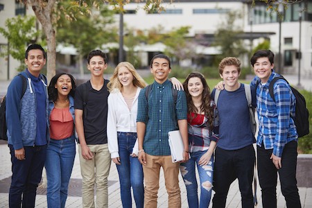group of teens outside school 