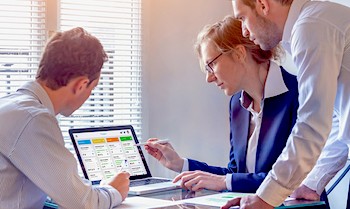 young man looks at results of transition assessment