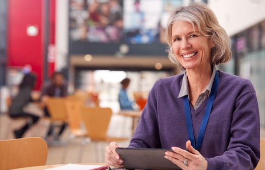 woman who is studying in a library