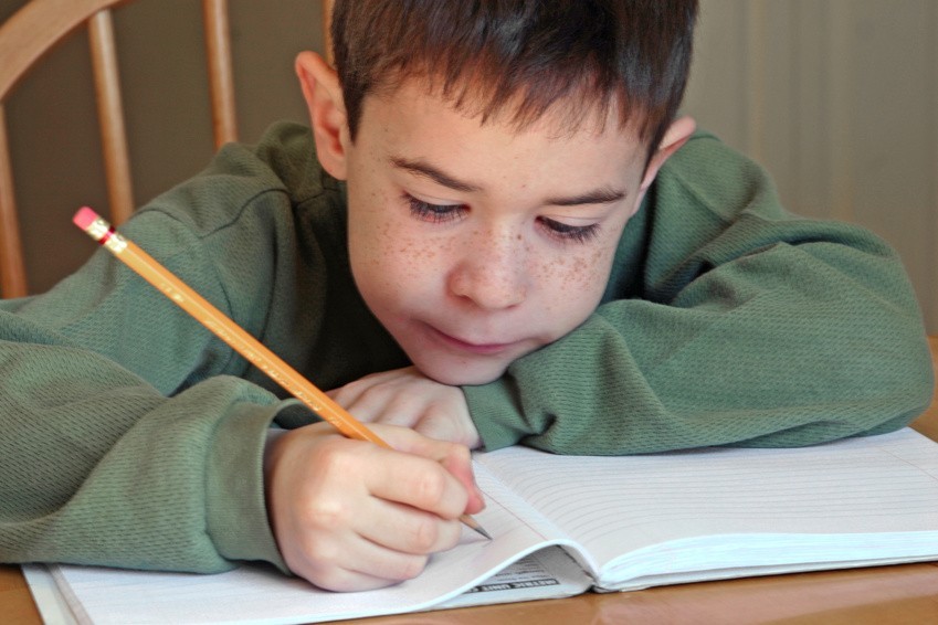 school boy taking test