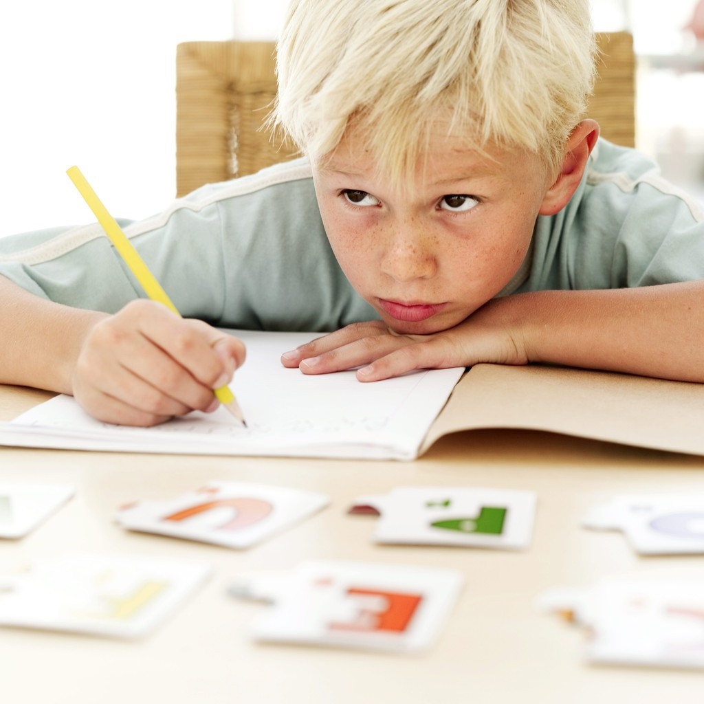 young blond boy at school