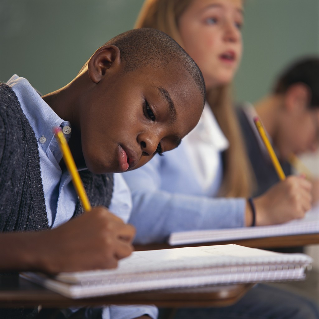 boy in class taking test