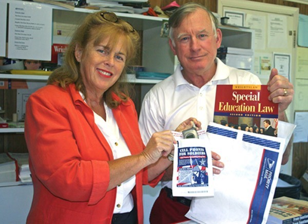 Pete & Pam Wright pack Wrightslaw product orders with recycling envelopes for Cell Phones for Soldiers